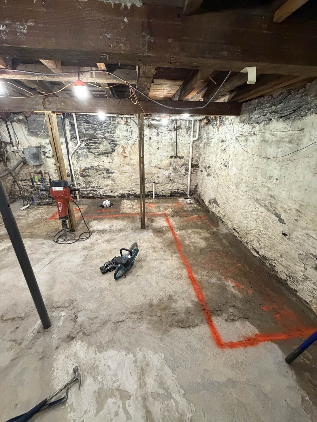 Basement floor marked out for the next phase of work
