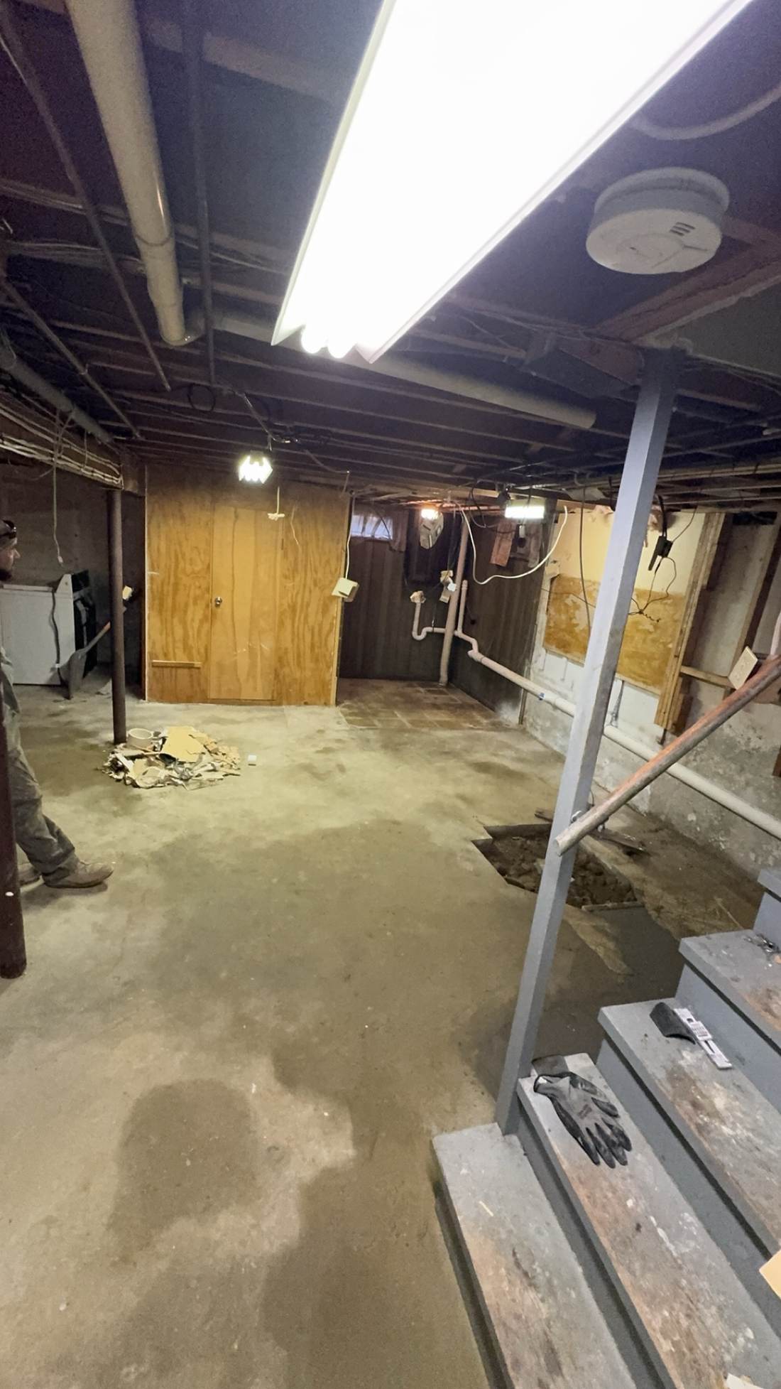 Basement storage room being built out with plywood