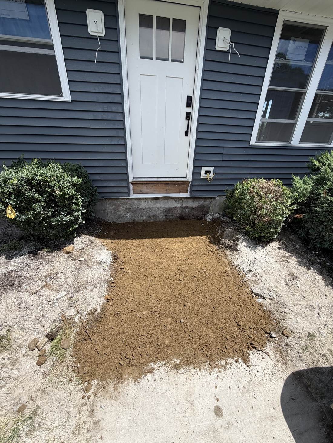 Front entry walkway prepped ahead of new steps