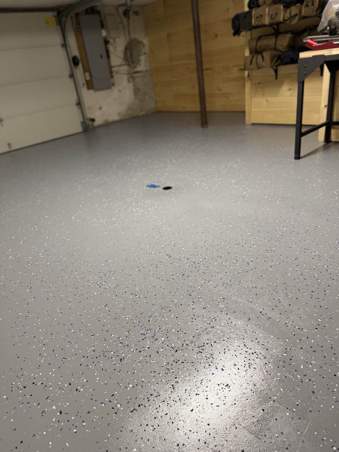 Close-up of epoxy flake floor coating in a finished garage